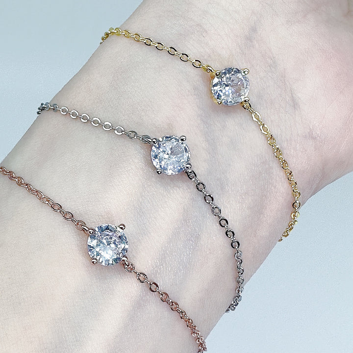 ADJUSTABLE ALLURING ILLUMINATED BRACELET IN ROSE GOLD, 18K GOLD-PLATED, AND STERLING SILVER WITH A SINGLE CRYSTAL AND 5A GRADE CZ STONE