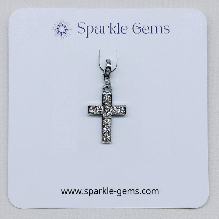 Simple Silver Sparkling Cross Pendant  This gorgeous sterling silver sparkling cross pendant is secured on your choice of sterling silver pendant carrier. Our sterling silver lobster clasp is perfect for adding the cross pendant to your own charm bracelet or if you would like to simply thread the charm onto your own necklace chain.&nbsp;  A simple cross design ideal for everyday wear.